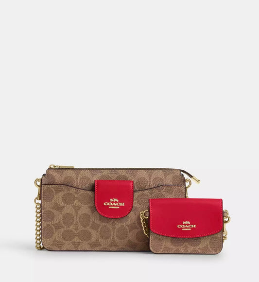 NWT Coach Poppy Crossbody Bag
In Signature Canvas