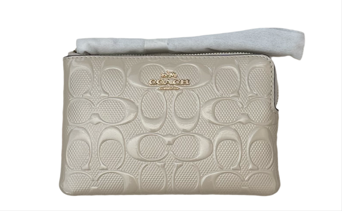 Coach Corner Zip Wristlet In Signature Patent Leather In Ivory