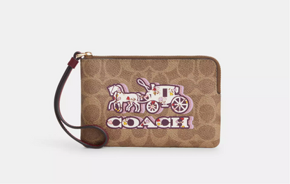 Coach Corner Zip Wristlet In Signature Canvas With Horse And Carriage Print