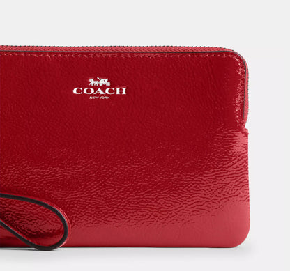 Coach Corner Zip Wristlet In Patent Leather In Silver/ Red