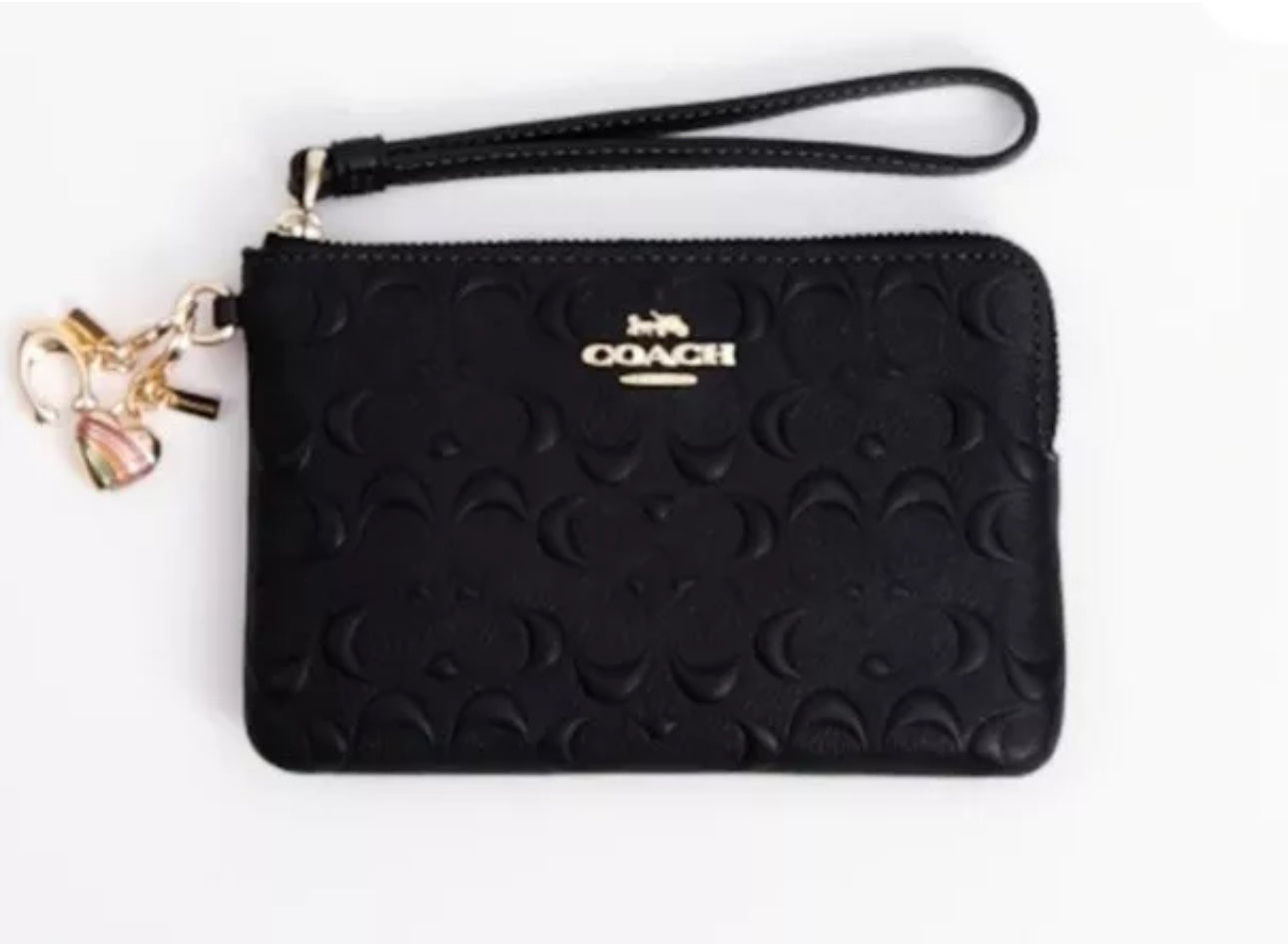 Coach Boxed Corner Zip Wristlet sold In Signature Leather