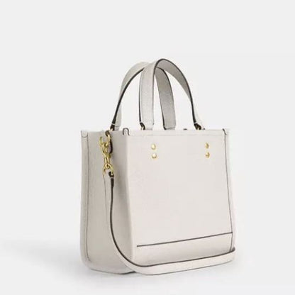 COACH Dempsey Tote 22 Refined Pebble Leather Crossbody Bag In Gold/Chalk